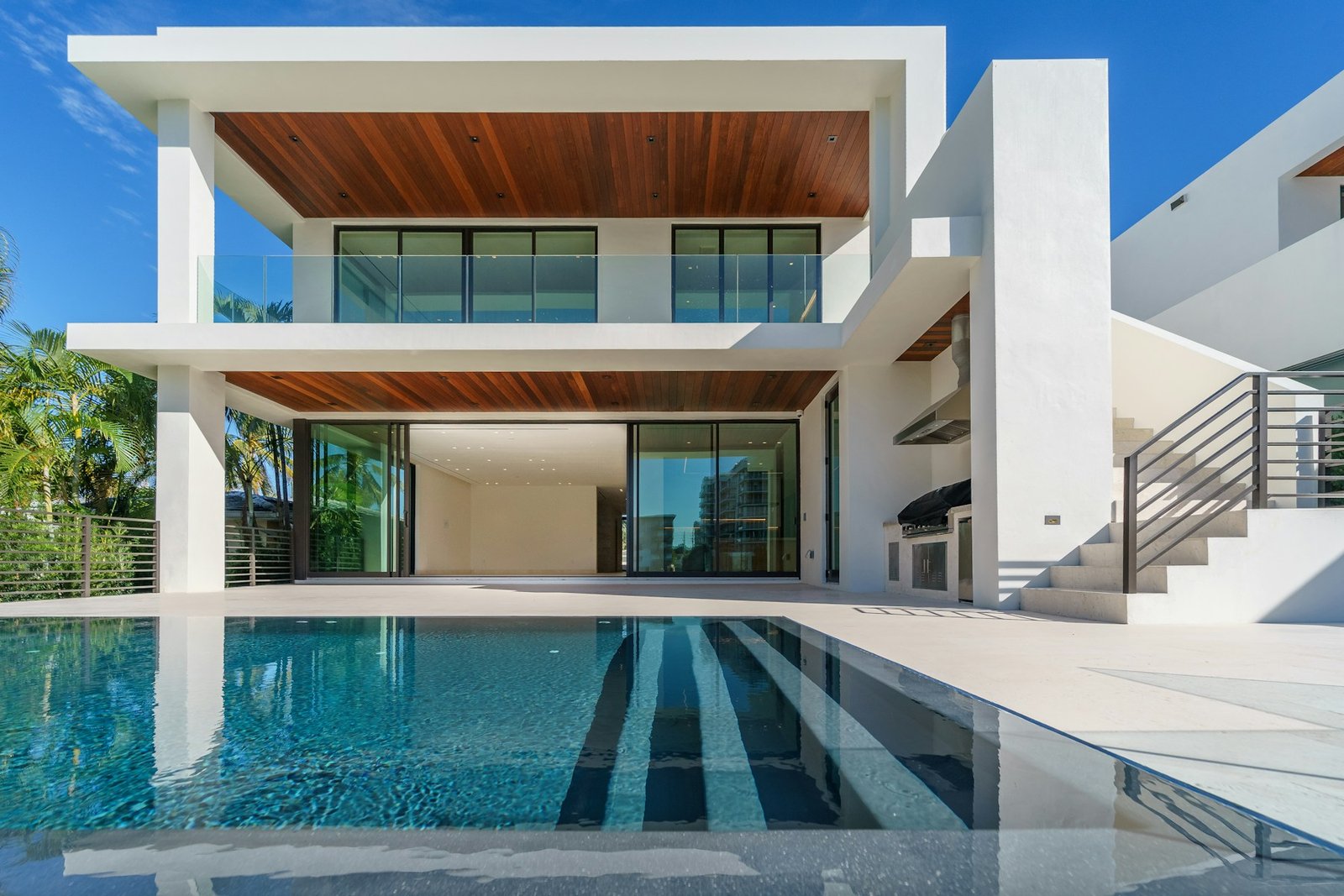 Sculptural modern home beneath a clear sky